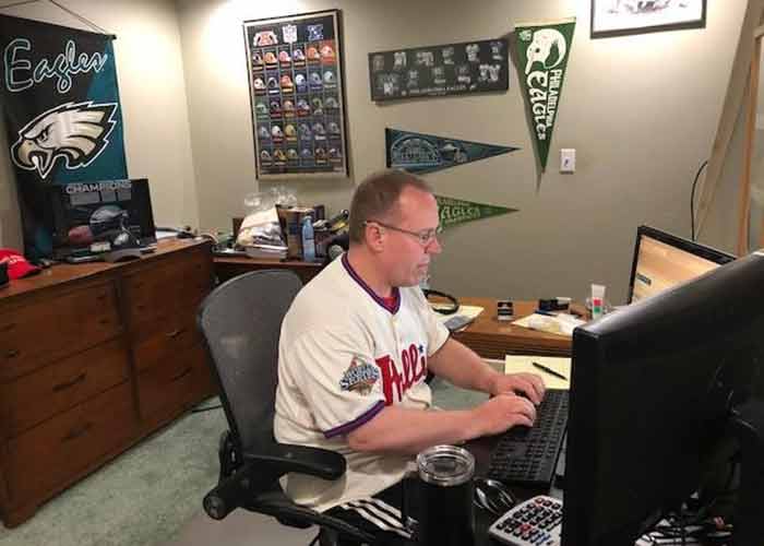 A banker works remotely to process PPP loans